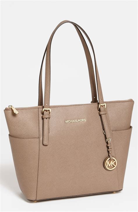 michael kors jet set tan leather purse|Michael Kors jet set airplane.